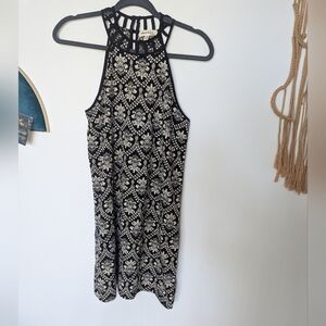 Black and beige pattern mini dress